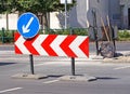 Arrow traffic signs at the road construction in the city Royalty Free Stock Photo