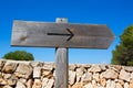 Arrow wooden track blank road sign in Mediterranean