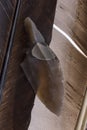 An arrowhead made from flintstone close up