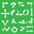 Set of white arrows icons on green background Royalty Free Stock Photo