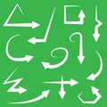 Set of white arrows icons on green background Royalty Free Stock Photo