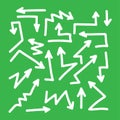 Set of white arrows icons on green background Royalty Free Stock Photo