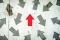 Arrows in different directions on a concrete wall. Red arrow, right direction. Leadership concept. Team. Business