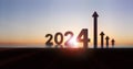 Brightly rising 2024 New Year sunrise and calendar background, growth graph and arrow rising high Royalty Free Stock Photo