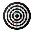 Arrows hitting target on dart board against white Royalty Free Stock Photo