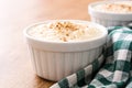 Arroz con leche. Rice pudding with cinnamon on wood Royalty Free Stock Photo