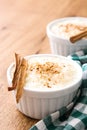 Arroz con leche. Rice pudding with cinnamon on wood Royalty Free Stock Photo