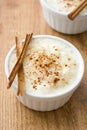 Arroz con leche. Rice pudding with cinnamon on wood Royalty Free Stock Photo