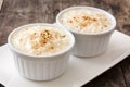 Arroz con leche. Rice pudding with cinnamon on wood Royalty Free Stock Photo