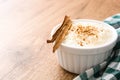 Arroz con leche. Rice pudding with cinnamon on wood Royalty Free Stock Photo