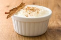 Arroz con leche. Rice pudding with cinnamon on wood Royalty Free Stock Photo