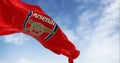 Arsenal Football Club flag waving on a clear day
