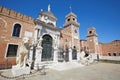 Arsenale di Venezia walls and white statues in Venice, Italy Royalty Free Stock Photo