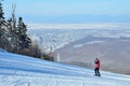 Arsenyev, Russia, January, 28, 2017. The man down the ski slope in the city of Arsenyev, Primorsky Krai