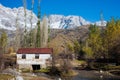 ARSLANBOB, KYRGYZSTAN: View of Arslanbob village in southern Kyrgyzstan, with mountains in the background during autumn.