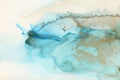 Art Abstract blue, beige and gold painting blots landscape background. Alcohol ink colors. Marble texture Royalty Free Stock Photo