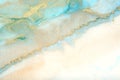 Art Abstract blue and gold painting blots landscape background. Alcohol ink colors. Marble texture