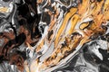 Art Abstract flow acrylic and watercolor marble blot painting. Black and gold glitter  Color wave horizontal texture background Royalty Free Stock Photo