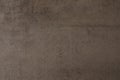 Art background of brown roughly plastered wall, copy space. Royalty Free Stock Photo