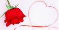 Art banner design of red roses and the paper heart on Valentine Day cup of coffee with a red rose.selectiv focus Royalty Free Stock Photo