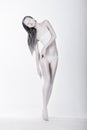 Art Bodypainting. Silhouette of Enigmatic Stylized Female Painted White Royalty Free Stock Photo