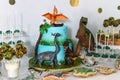 Art cake with different dinosaurs Royalty Free Stock Photo