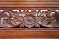 Flower motif teak wood carving, rough and embossed texture,, Royalty Free Stock Photo