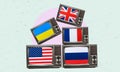 Art collage, lots of retro TVs with flags of countries around the world
