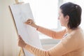 Artist with pencil drawing picture at art studio Royalty Free Stock Photo