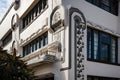 art deco building with geometric and organic architectural details