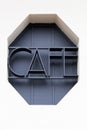 Art deco cafe sign on a wall Royalty Free Stock Photo