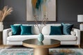 Art deco interior design of modern living room, home. Golden round coffee table near white sofa with teal pillows against wall Royalty Free Stock Photo