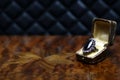 Art deco ring on an antique table luxury jewellery stillife Royalty Free Stock Photo