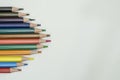 Art and drawing creative concepts of colorful crayon pencils with triangle shape on white background. Royalty Free Stock Photo