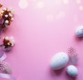 Art Easter eggs and Beautiful spring cherry tree flowers on pink background. Springtime Easter background Royalty Free Stock Photo