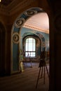 Art exhibition in the hall of the old estate Turliki, passage through the arch: Obninsk, Russia