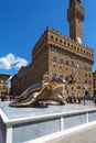 Art exhibition in Piazza della Signoria in Florence with a bronze turtle