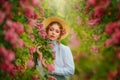 Art Fantasy young woman in vintage straw hat looks at camera blue eyes, girl princess pretty face red pink lips make-up Royalty Free Stock Photo