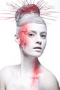 Art fashion girl with white skin and red paint on Royalty Free Stock Photo