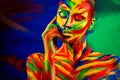 Art fashion makeup and body paint. Color face of woman for inspiration. Abstract portrait of the bright beautiful girl