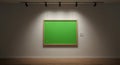 Art gallery exhibition with a blank green screen frame for mockups or display Royalty Free Stock Photo