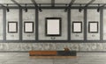 Art gallery in loft with concrete wall and iron elements