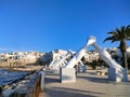 The art of hands: the bridge of ideals by Lorenzo Quinn in Vieste, Puglia, Italy.