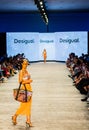 Art Heart Fashion Miami Swim Week - Desigual Fashion show. Models walking runway.