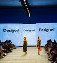 Art Heart Fashion Miami Swim Week - Desigual Fashion show. Models walking runway.