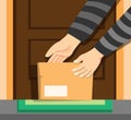 Thief hand take package box online shop in front door home, awareness from theft steal someone parcel crime activity cartoon illus