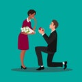 Young guy on knees proposing young beautiful girl for marriage Royalty Free Stock Photo