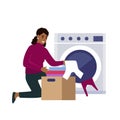African american Woman doing laundry at home