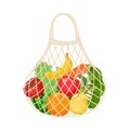 Reusable mesh eco bag with fresh food. Fruits and vegetables in grocery cotton bag