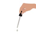 Female Hand Holding Pipette and Dropping Liquid